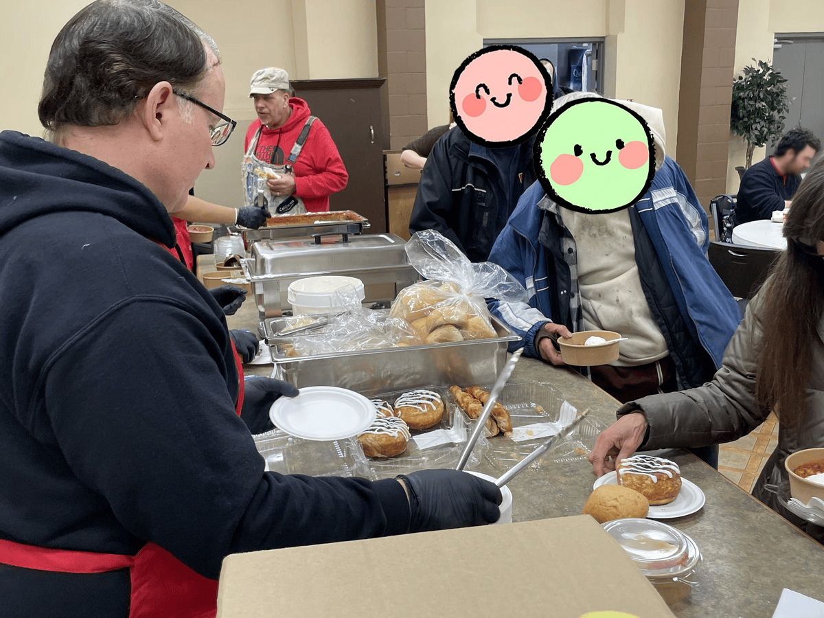 Community kitchen volunteers preparing the meal