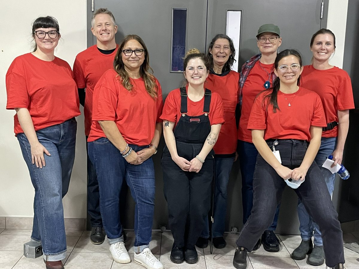 Volunteer team line-up at the fair